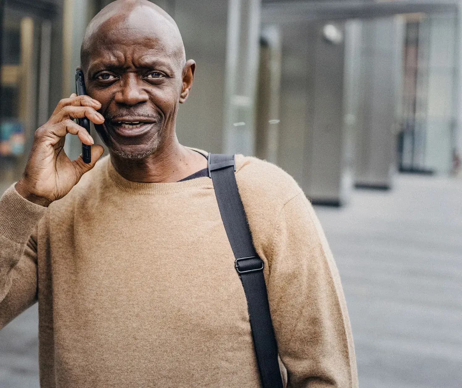 A man making a call from the street